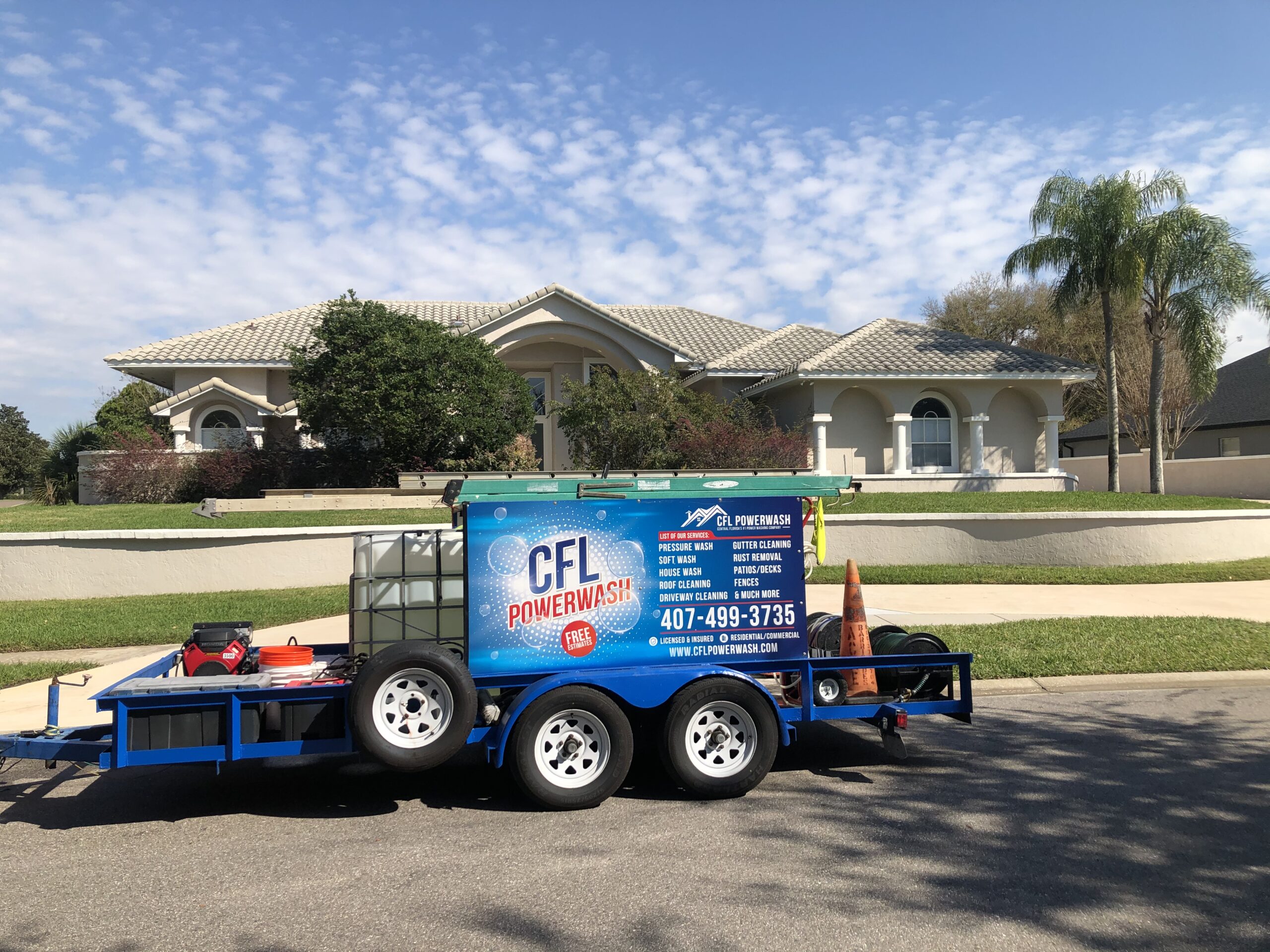 CFL PowerWash team cleaning a Florida home exterior