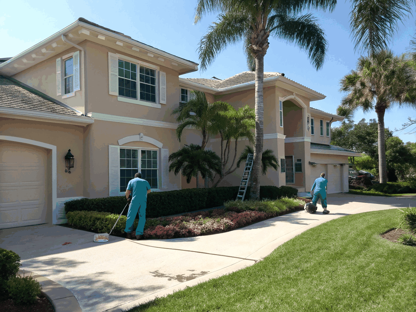 Clean Florida home exterior with paver driveway and tidy roofline