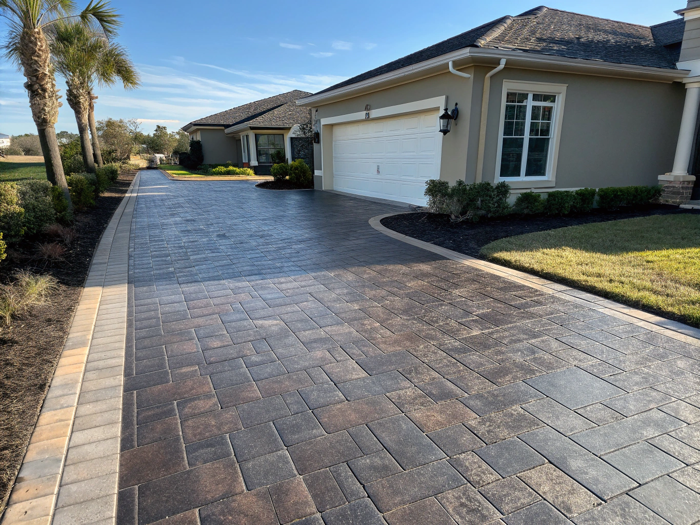 Sealed decorative driveway pavers with rich finish