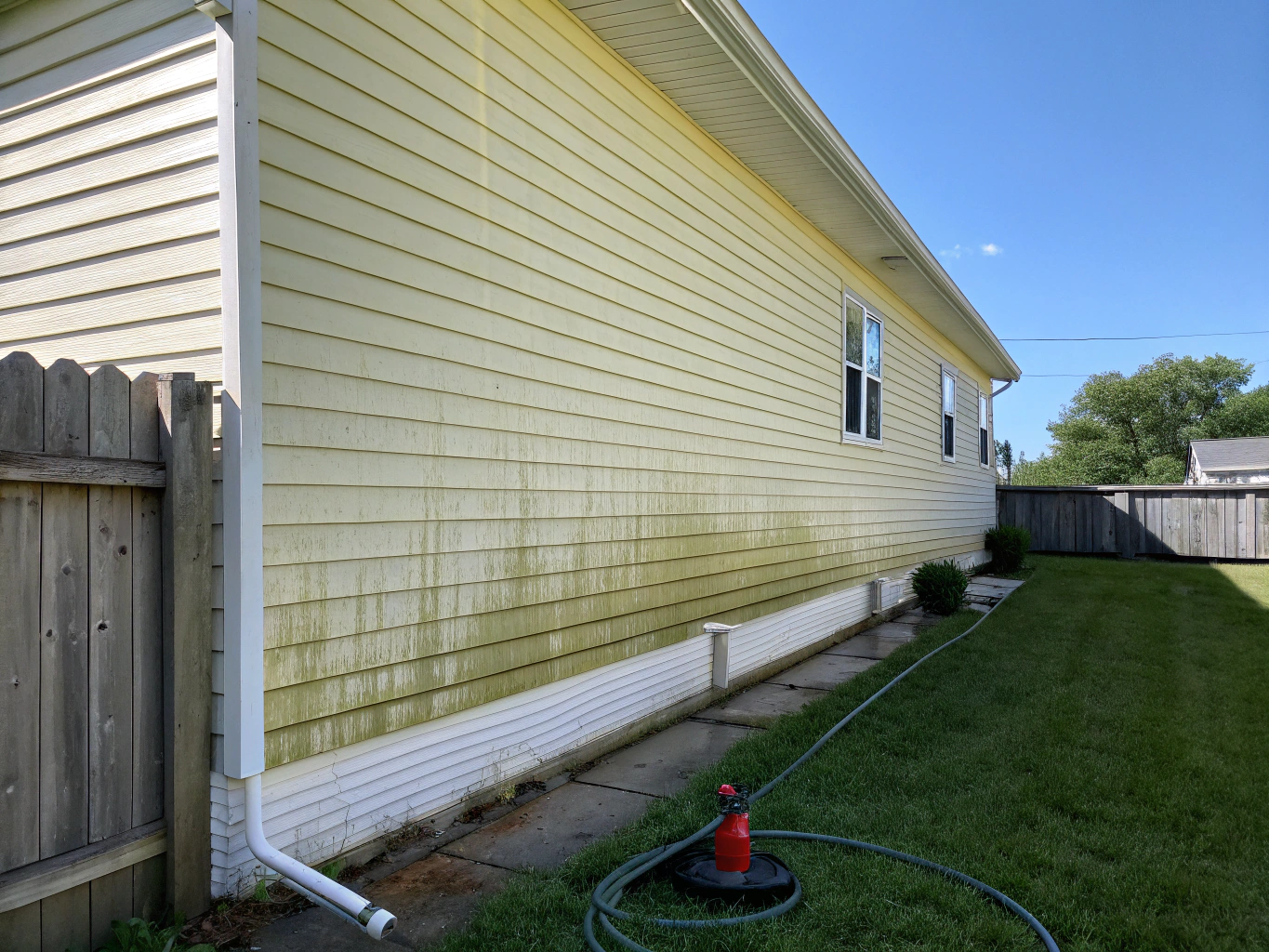 Concrete home entryway and front walkway after cleaning